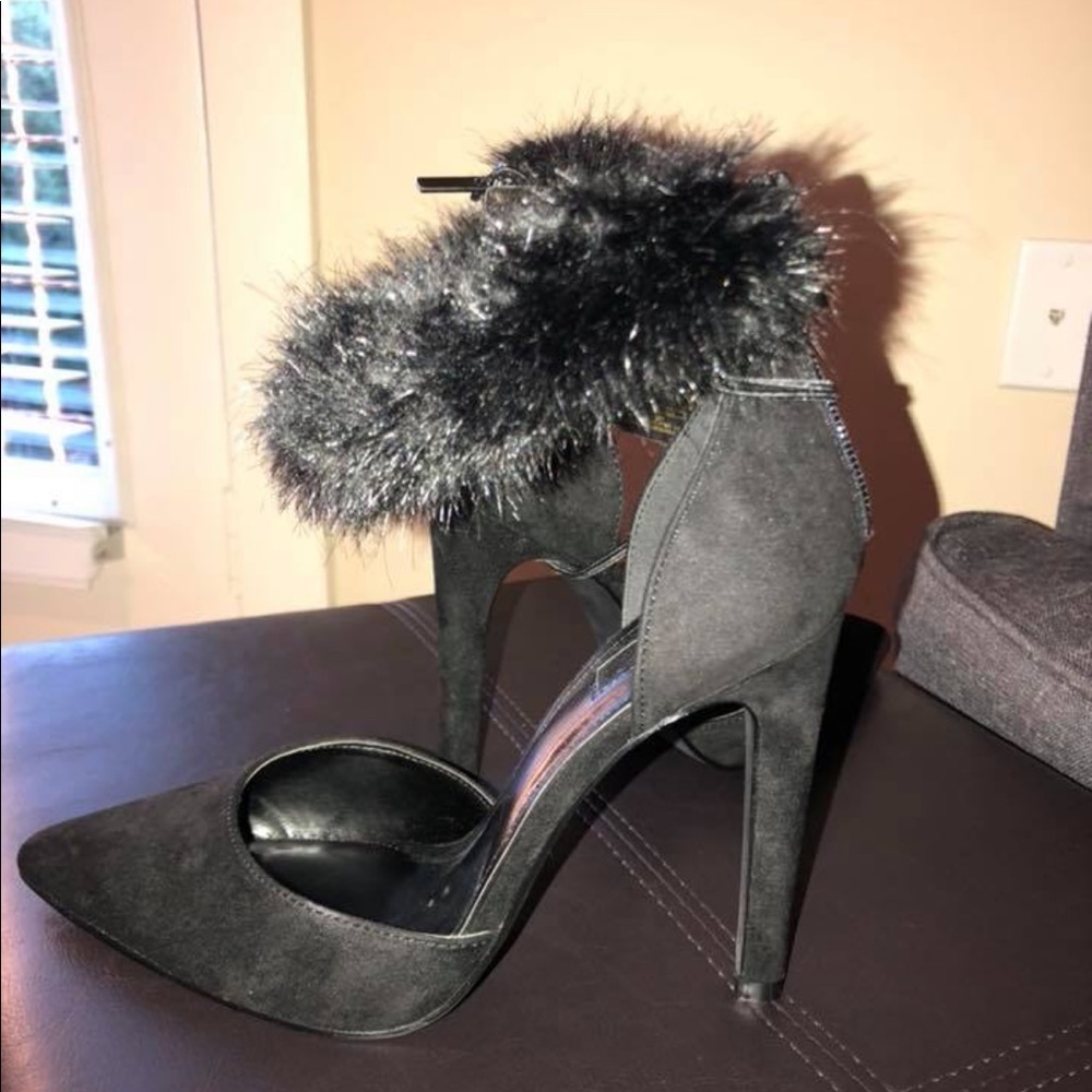 Black pointed toe heels. Never worn!